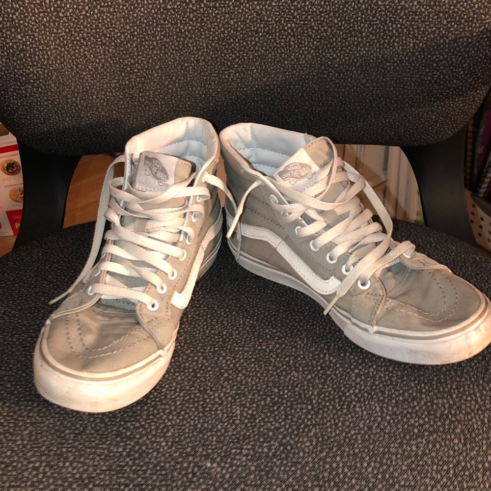 grey and white high-top vans.